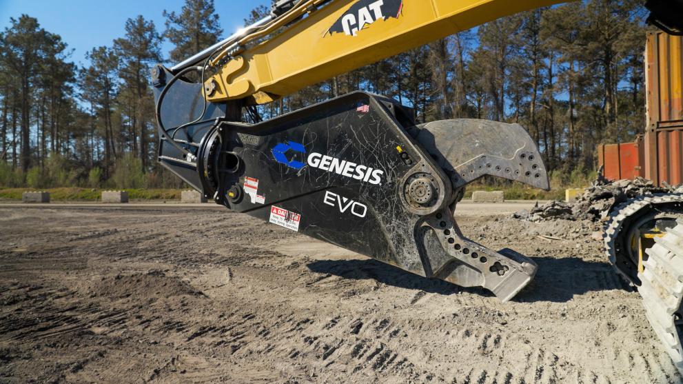 Black GXT EVO on a Cat excavator facing right.