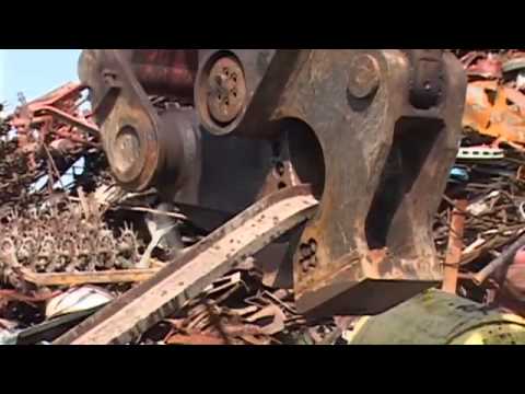 Watch the Genesis Linkage Shear efficiently process a scrap pile. 